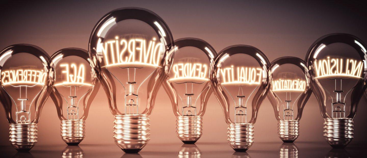 Multiple light bulbs with words written in them like Diversity and inclusion